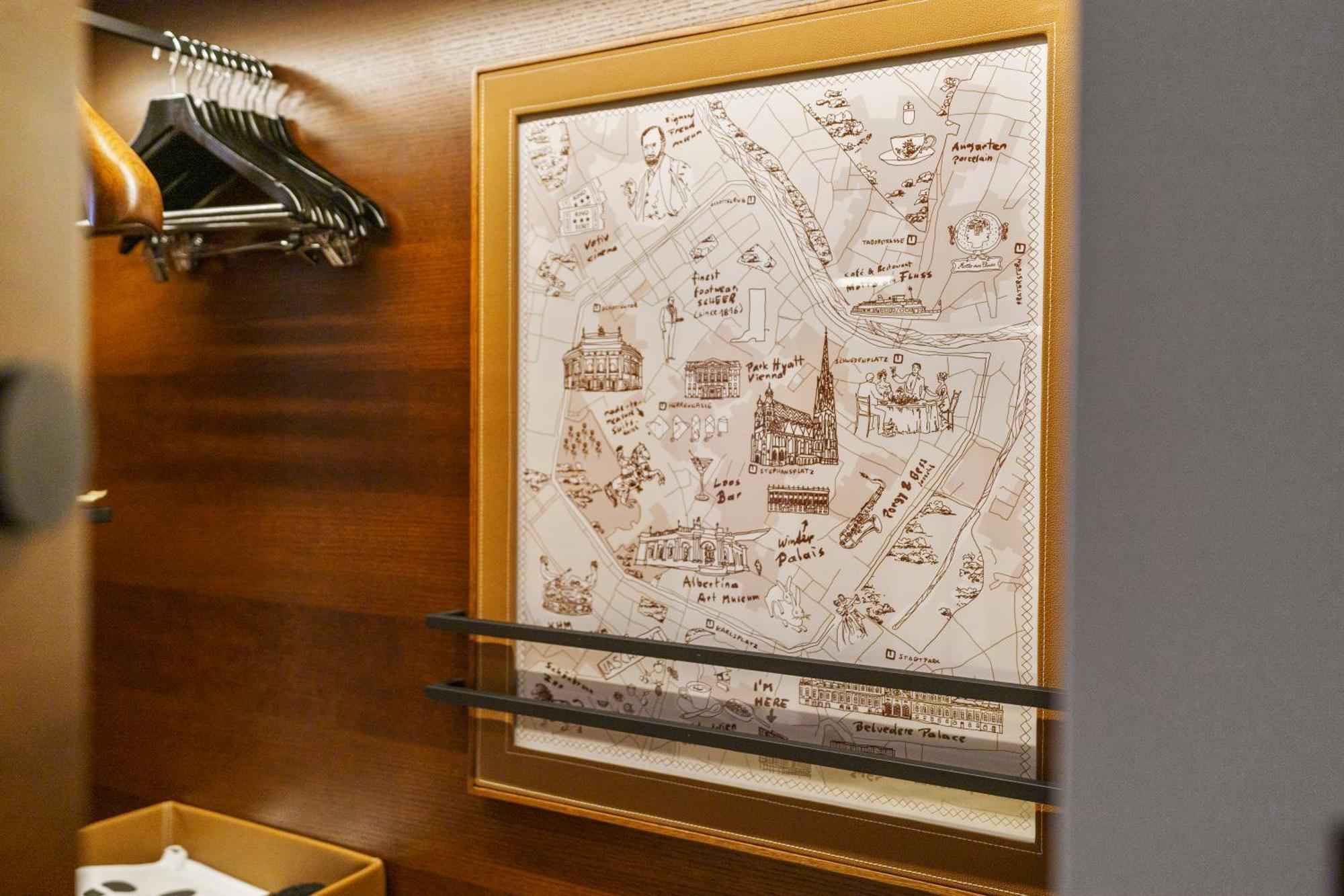 Andaz Vienna Am Belvedere, By Hyatt Room photo A map of the city of Rome on the wall of a train compartment